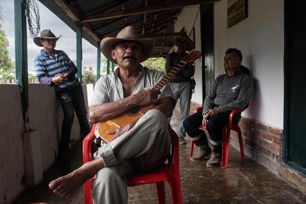 Antonio Cantor, a pistol-packing <em>llanero</em>, plays a four-string guitar known as a cuatro, and croons songs about the joys of riding horseback, herding livestock and courting local women.