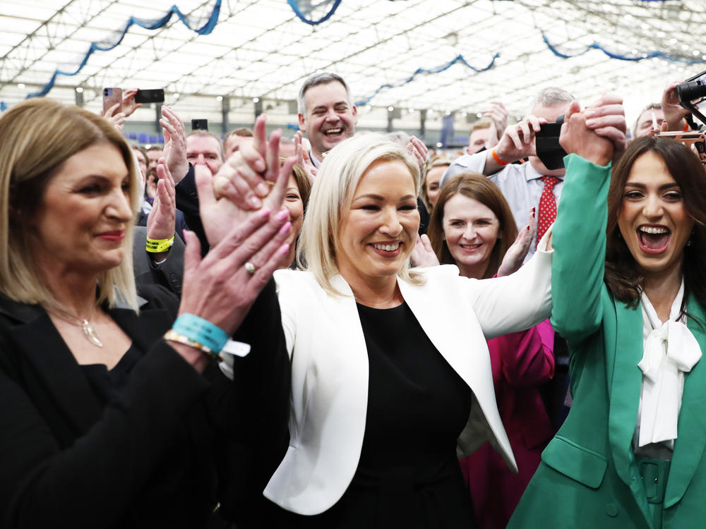 Sinn Fein's Vice President Michelle O'Neill (center) celebrates with party colleagues after being elected in Mid Ulster at the Medow Bank election count center in Magherafelt, Northern Ireland, on Friday.
