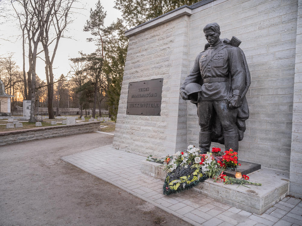 The Bronze Soldier monument, with the stone structure reconstructed, at its new permanent location at the Tallinn Military Cemetery.