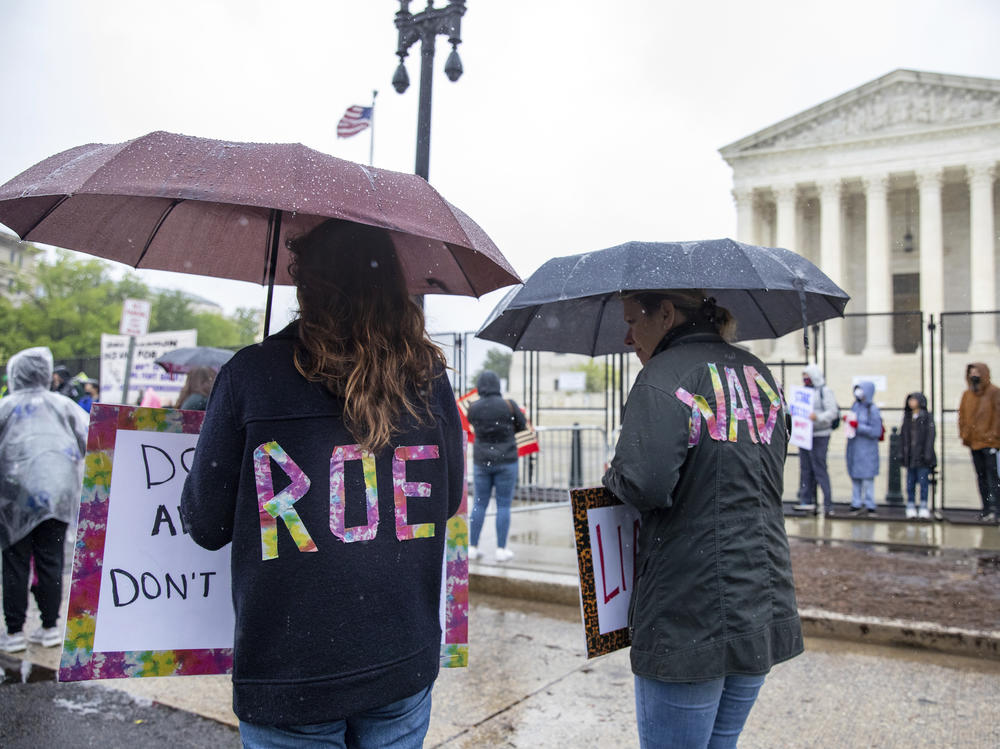 Abortion rights protesters hold a demonstration outside of the  Supreme Court on Saturday in Washington.