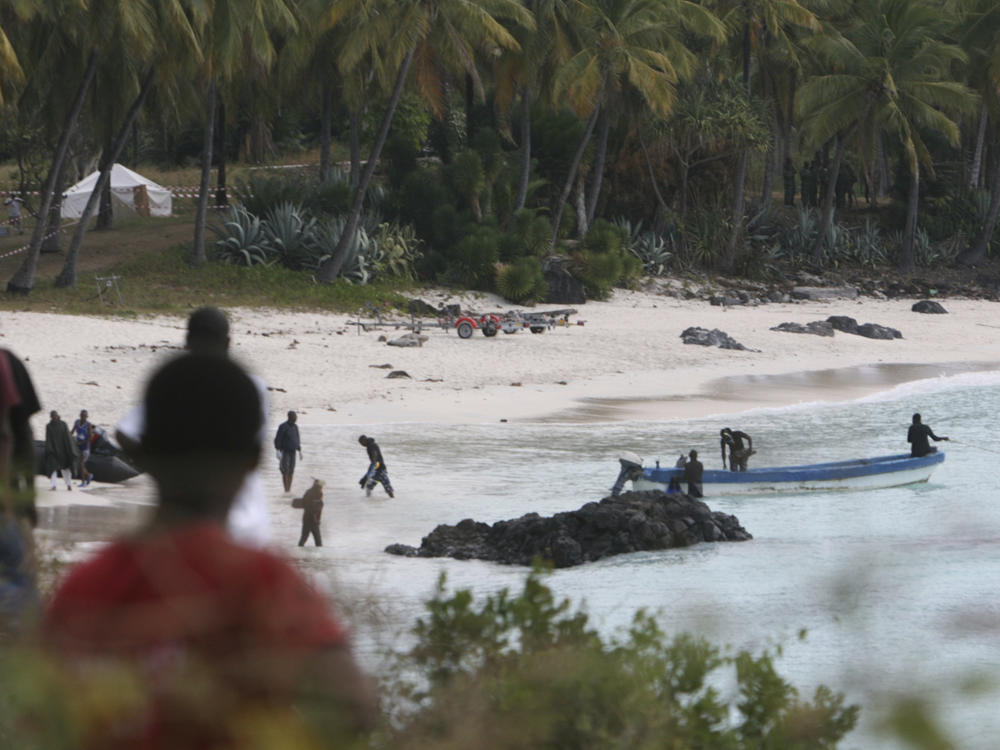 Rescuers gather at Galawa Beach, about 22 miles from Moroni, Comoros, July 1, 2009, as they prepare to search the area after a Yemenia Airbus passenger plane crashed into the Indian Ocean off the island nation of Comoros as it attempted to land in the dark amid howling winds.