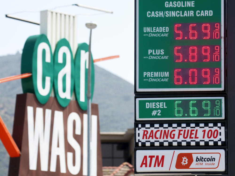Gas prices are displayed at a station in Burbank, Calif., on April 27. Gas prices have surged along with other consumer goods, hurting pocketbooks across the country.