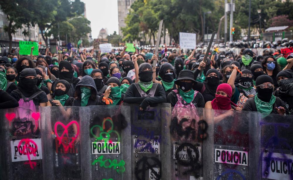 Supporters of the legalization of abortion clash with riot police during International Safe Abortion Day in Mexico City on September 28, 2020. Last year, Mexico's Supreme Court ruled that criminal penalties for abortion are unconstitutional.