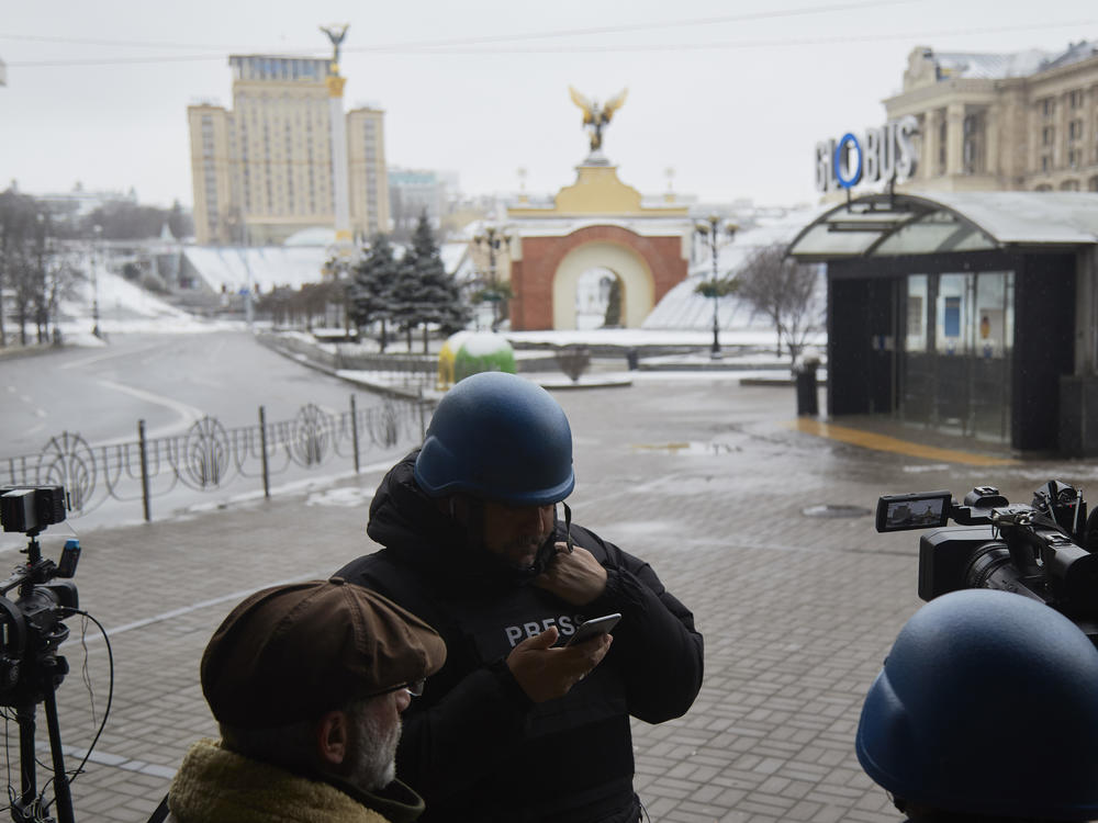 Journalists conduct interviews on the doorstep of an hotel on Maidan Square on March 1, 2022 in Kyiv, Ukraine. The Pulitzer Prize Board is honoring the courage and commitment of Ukranian journalists.