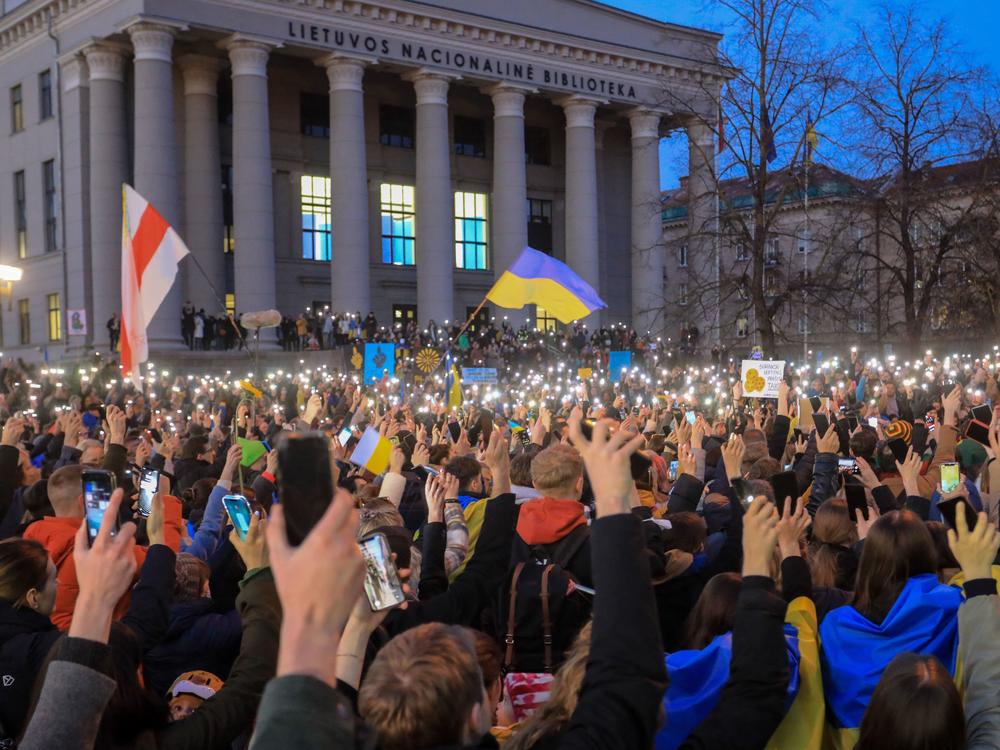 Demonstrators protest the Russian invasion of Ukraine at Independence Square in front of the Parliament Palace in Vilnius, Lithuania, on March 24, 2022. Lithuania's parliament has since declared Russia a perpetrator of terrorism and genocide.