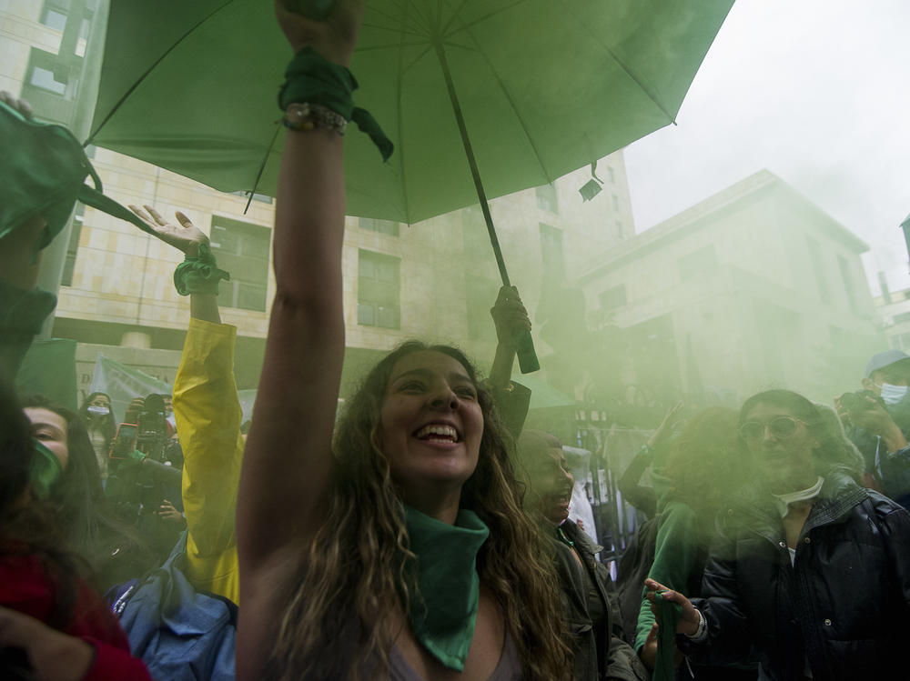 Demonstrators who support abortion rights celebrate outside the Constitutional Court in Bogota, Colombia on February 21. After an 8-hour debate, the court decriminalized abortions during the first 24 weeks of pregnancy.