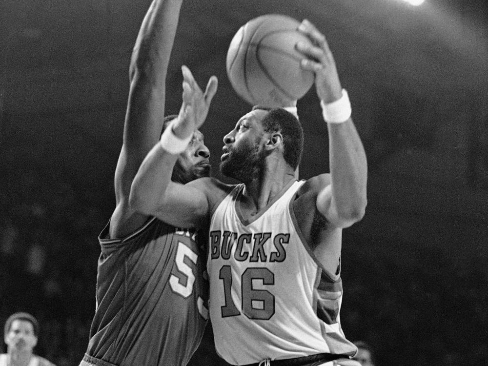 The Milwaukee Bucks' Bob Lanier (16) moves for the basket as Philadelphia 76ers Darryl Dawkins defends during an NBA playoff game on April 13, 1981, in Milwaukee. Lanier died on Tuesday at age 73.
