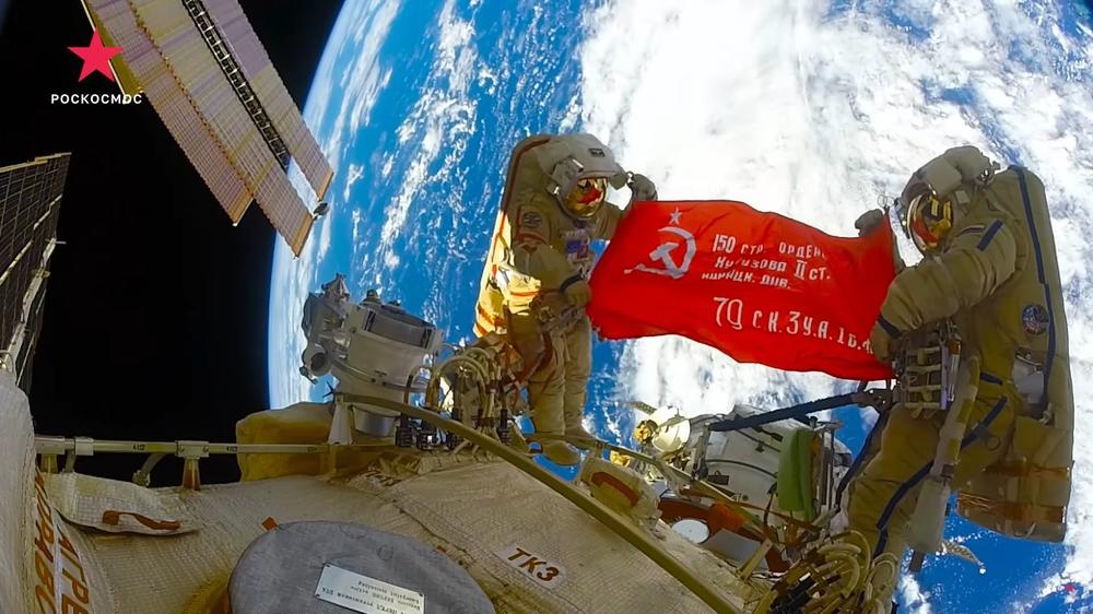 Cosmonauts unfurled a Soviet-era victory banner on a recent space walk. The banner, which is used to mark 
