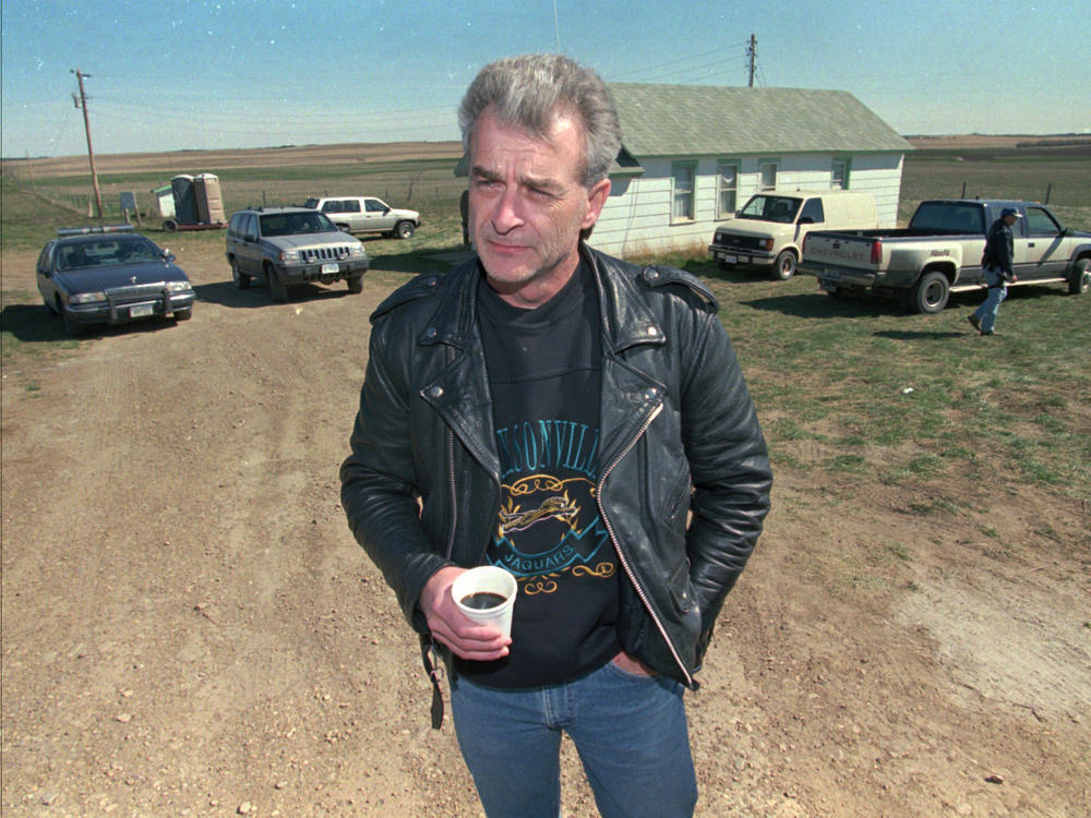 Randy Weaver, the object of the Ruby Ridge siege, visits with the media at the main FBI roadblock outside the Freemen compound in Montana on April 27, 1996. Weaver, who served as a spark for the growth of anti-government extremists, has died at the age of 74.