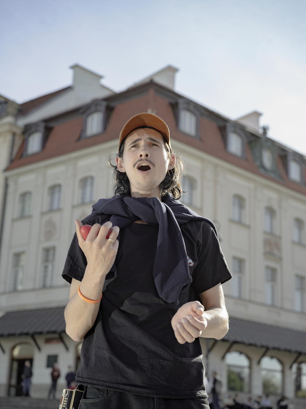 Roman Panchenko sings Ukrainian music for the homesick in Castle Square in Warsaw, Poland, on Tuesday.