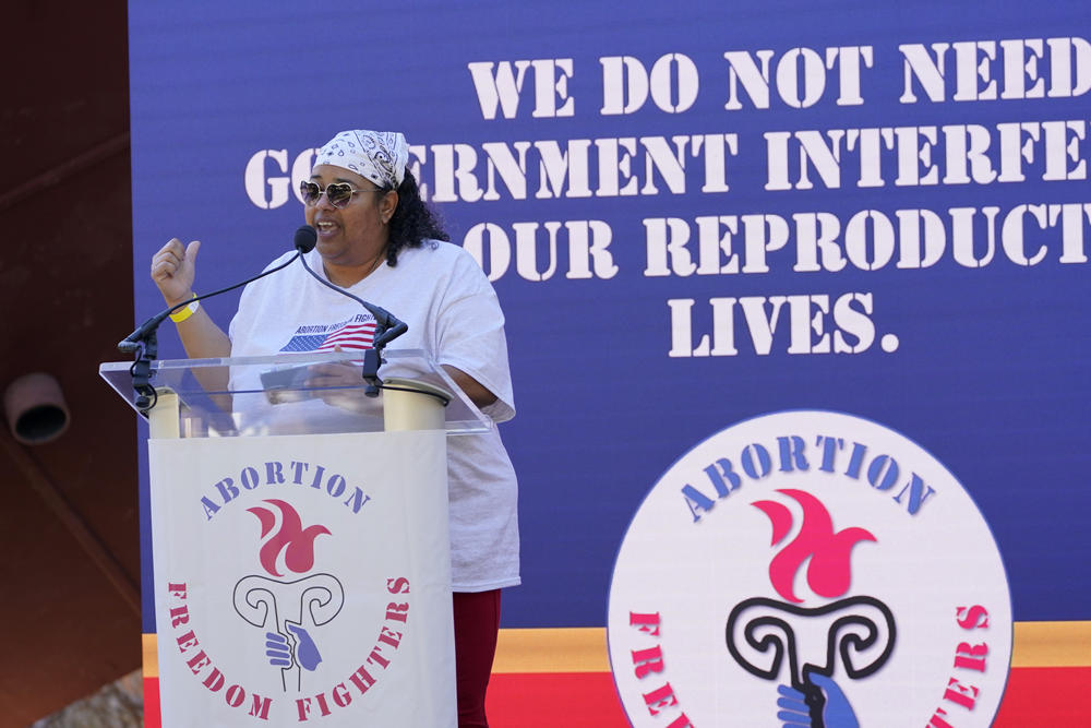 Michelle Colon, co-founder and executive director of SHERO, reminds the audience that the government 