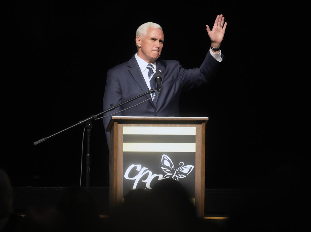 Former Vice President Mike Pence speaks at a fundraiser for Carolina Pregnancy Center on May 5 in Spartanburg, S.C. Pence will campaign with Georgia's incumbent Republican Gov. Brian Kemp the day before this month's GOP primary in his most significant political beak with former President Donald Trump to date.