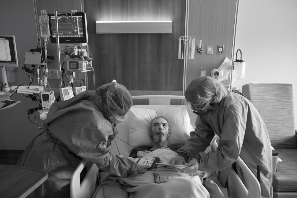 Tony Johnson receives a blood transfusion on April 14, 2020 to address ongoing health issues resulting from COVID-19. Because Whidbey is a critical access hospital, patients typically can't stay longer than 96 hours, so nurses are not trained to keep people on ventilators for long periods of time. But nurses have had to learn new skills to save lives during the pandemic.