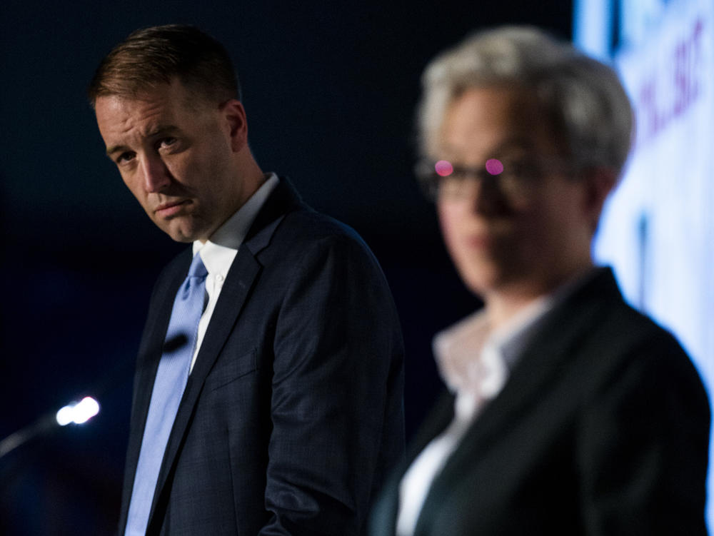Oregon Treasurer Tobias Read participates in a debate with former state House Speaker Tina Kotek on March 18 in Portland, Ore. They are two of the top candidates for the Democratic Party's nomination in the Oregon governor's race.