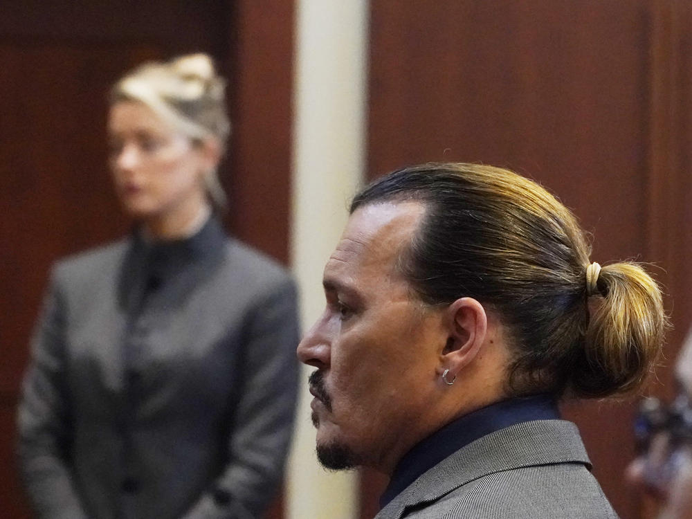 Actor Johnny Depp walks into the courtroom after a break at the Fairfax County Circuit Courthouse in Fairfax, Va., on Monday.