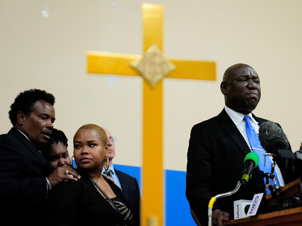 Attorney Benjamin Crump, accompanied by the family of Ruth Whitfield, a victim of shooting at a supermarket, speaks with members of the media during a news conference in Buffalo, N.Y., on Monday.