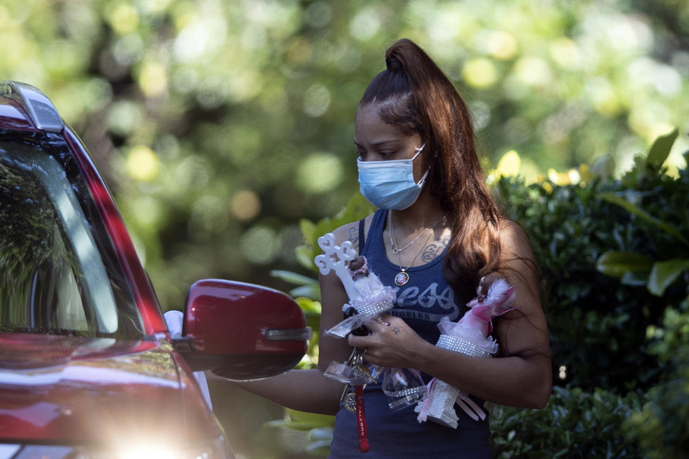 Charmaine Turner prepares to enter a viewing her for 8-year-old daughter Secoriea Turner, who was fatally shot in Atlanta on July 4 in 2020.