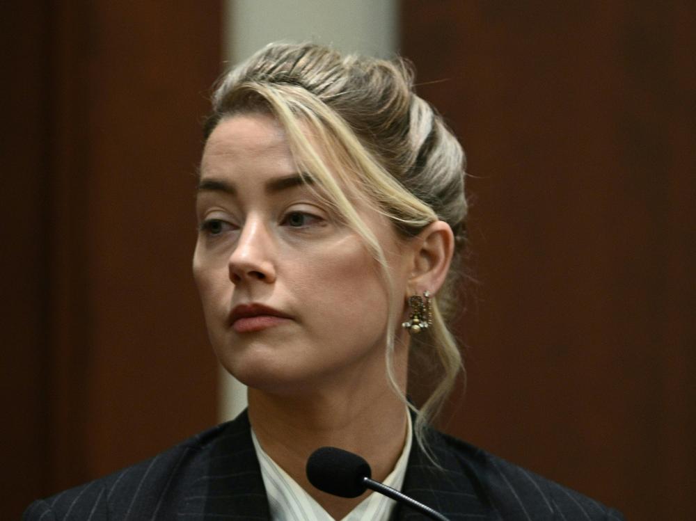 Actor Amber Heard testifies in the courtroom at the Fairfax County Circuit Court in Fairfax, Va. on Tuesday.