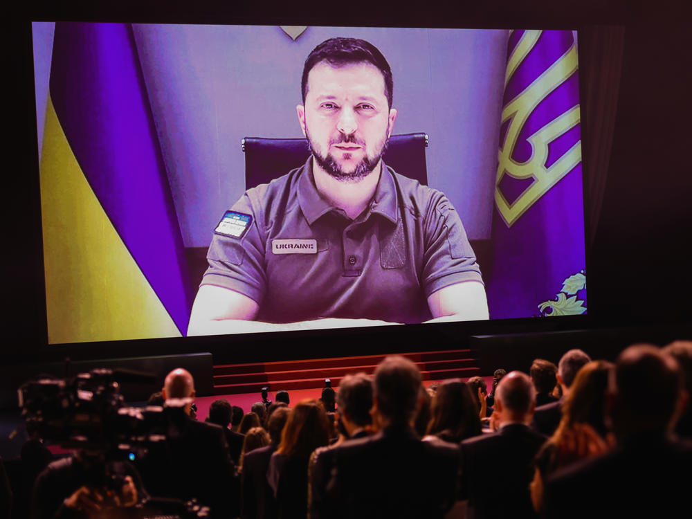 President of Ukraine Volodymyr Zelenskyy speaks via video during the opening of the  Cannes film festival on Tuesday.