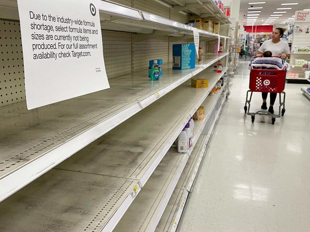 A woman shops for baby formula in Annapolis, Md., on May 16. Only a handful of companies supply baby formula in the country, a factor that has contributed to the current shortages being experienced in parts of the country.