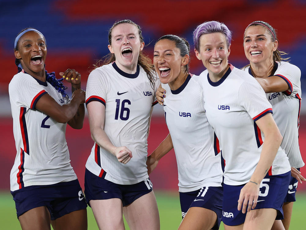 Players on the U.S Women's National Team celebrate their victory in the penalty shootout over the Netherlands in the Women's Quarter Final match of the Tokyo 2020 Olympics.