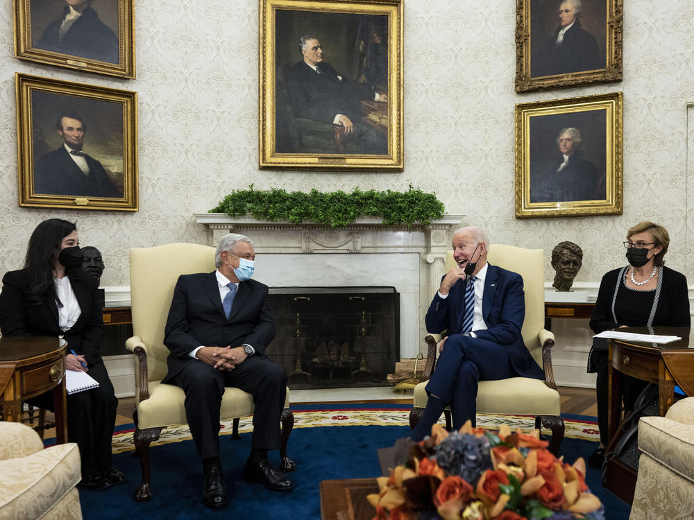 U.S. President Joe Biden, second from right, meets with Mexican President Andres Manuel Lopez Obrador, second from left, in the Oval Office of the White House on Nov. 18, 2021.