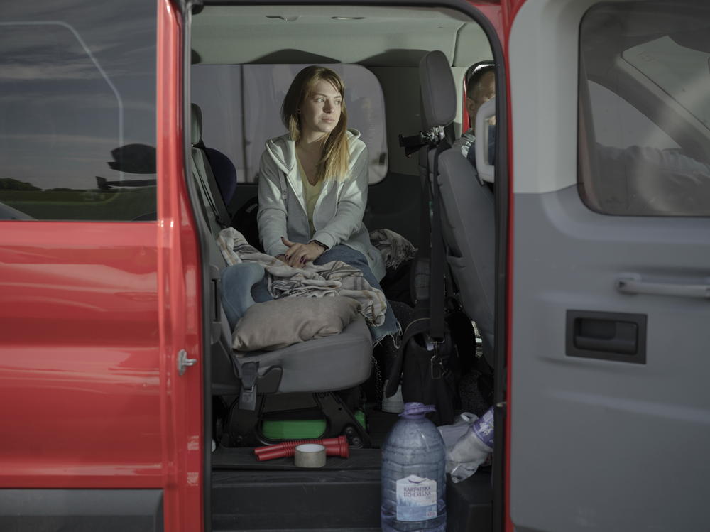 Anna Kobernyk waits in van at the Poland-Ukraine border.