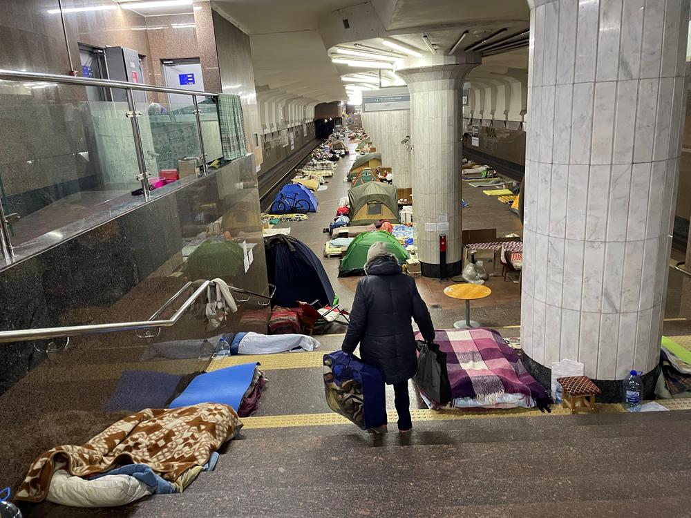 A woman walks through the Oleksiivska station in Kharkiv, Ukraine. Thousands of residents have been sheltering in the city's subway stations, but the mayor says it's safe to emerge now that Russian forces are retreating.