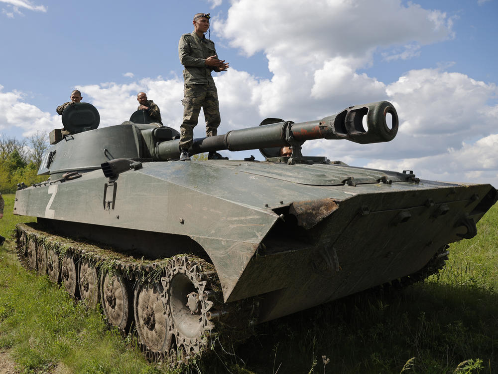 Russian-backed Donetsk militia fighters man 