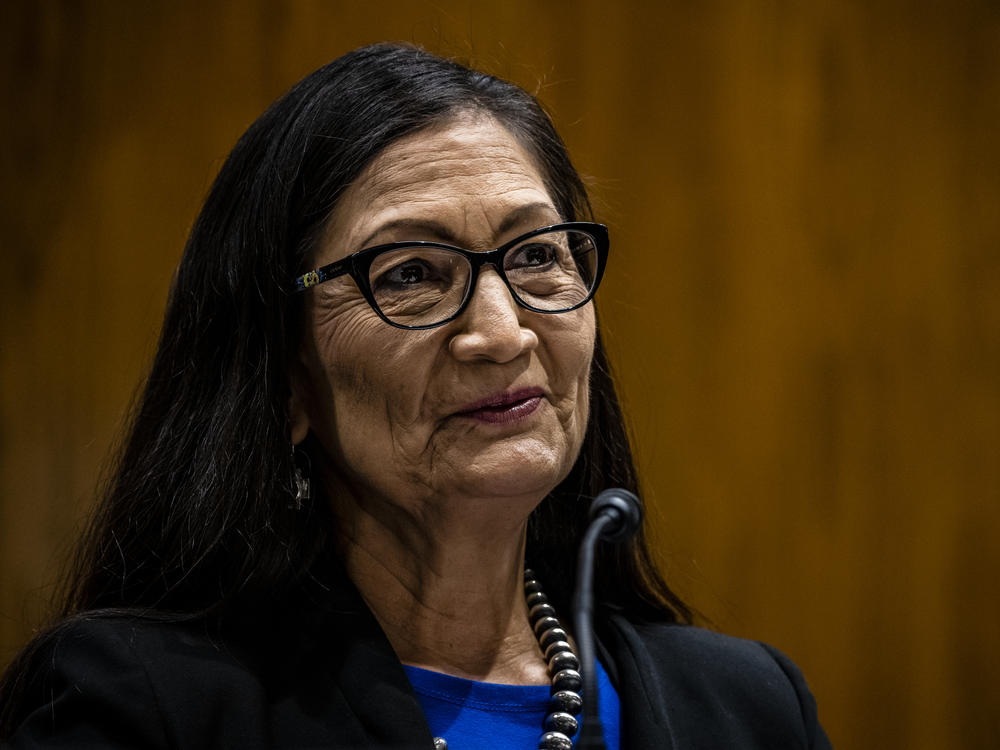 Interior Secretary Deb Haaland will speak with survivors of Native American boarding schools as part of a tour called 