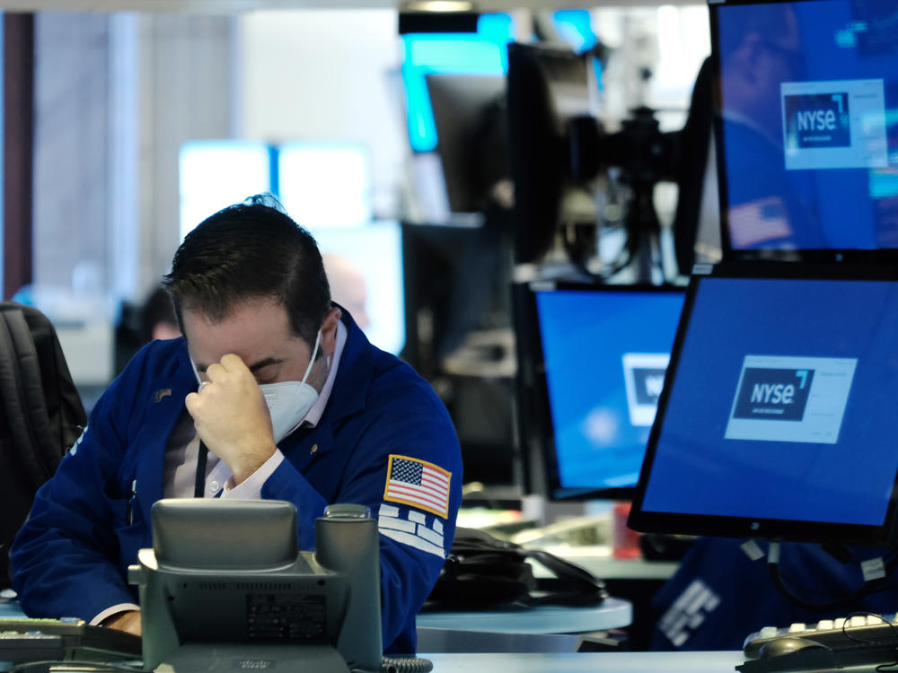 Traders work on the floor of the New York Stock Exchange (NYSE) in New York City on May 18. Stocks have tumbled this year because of fears about the economy.