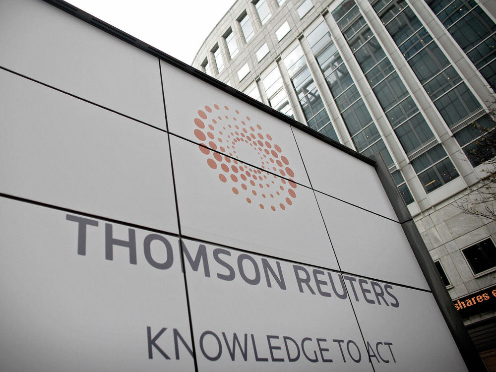 A new signboard is displayed at the Thomson Reuters building in London on April 17, 2008. One of Wood's bets in the 1980s was a company called Reuters, which she felt was being unfairly ignored by Wall Street. Reuters eventually became part of what is now known as Thomson Reuters.