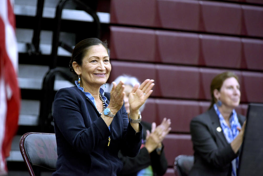 Secretary Interior Deb Haaland on Saturday applauds people who helped make the bison range restoration possible for the Confederated Salish and Kootenai Tribes. Haaland joined the tribes inside the Salish Kootenai College's basketball gym to celebrate their reclaiming management of the wildlife refuge.