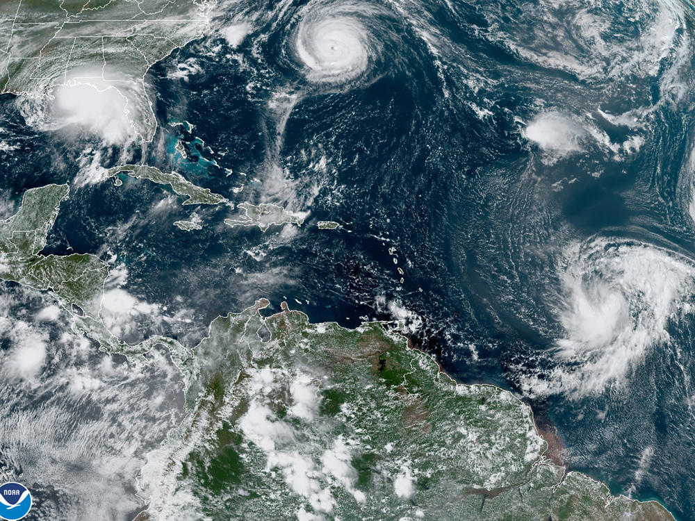 A satellite photo shows five tropical storms in the Atlantic in September 2020. Forecasters expect more hurricanes and tropical storms than usual in 2022. This is the seventh year in a row with an above-average number of storms forecast.