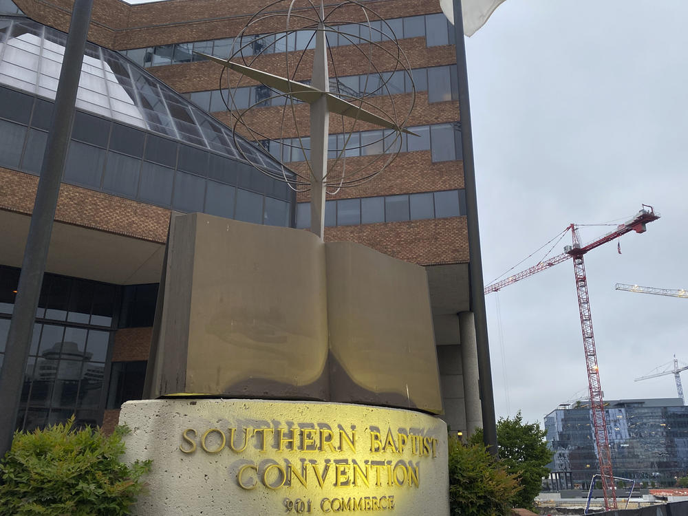A cross and Bible sculpture stand outside the Southern Baptist Convention headquarters in Nashville, Tenn., on Tuesday. Top administrative leaders for the SBC said that they will release a secret list of hundreds of pastors and other church-affiliated personnel accused of sexual abuse.