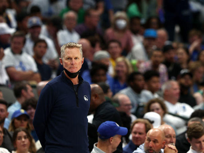 Head coach Steve Kerr of the Golden State Warriors looks on Tuesday as his team plays the Dallas Mavericks in Game Four of the NBA's Western Conference Finals in Dallas. Before the game Kerr refused to take questions about basketball, instead expressing his frustration and anger about the Uvalde, Texas, shooting and elected officials' failure to pass gun control measures.