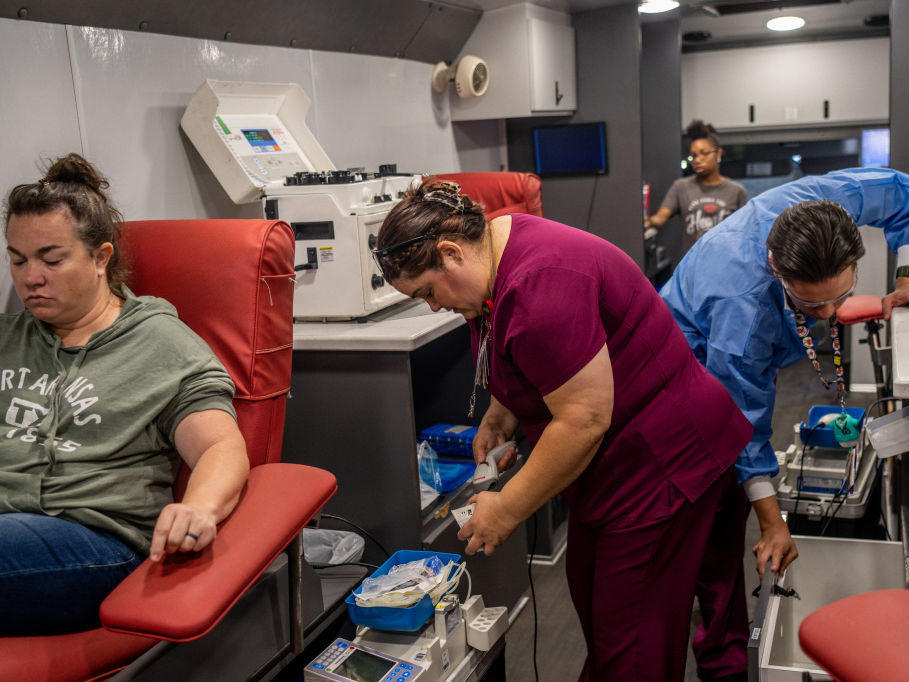 Blood bank technologists on May 25 prepare during an emergency blood drive for victims of the Uvalde school shooting.