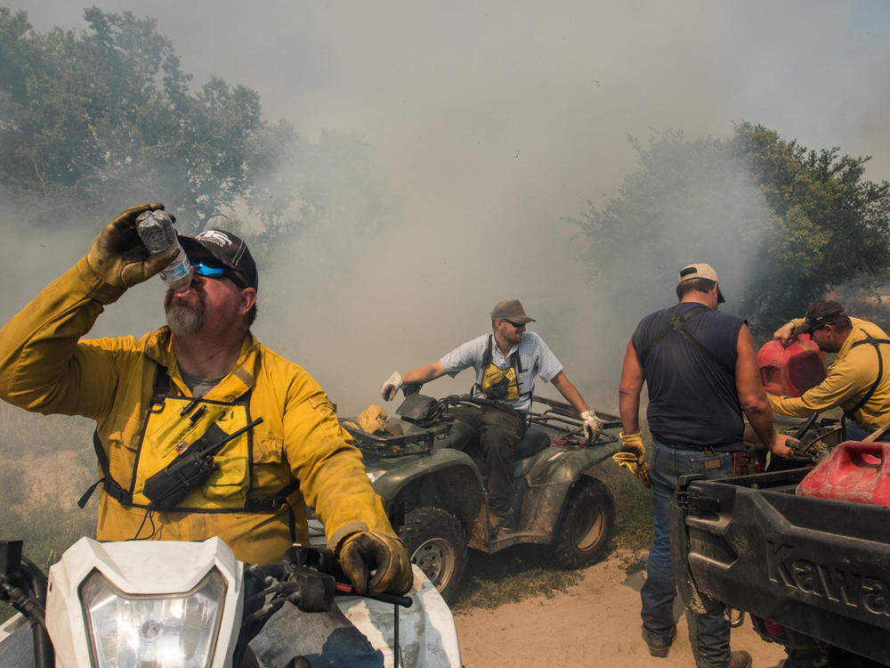 Members of a landowner-led prescribed burn association work together in south-central Nebraska to complete a 945-acre prescribed burn. Everyone on the burn performs an essential role, from the four-wheeler riding internal ignition team to the mop-up crew that patrols the perimeter with water tanks strapped to flatbed pickup trucks.