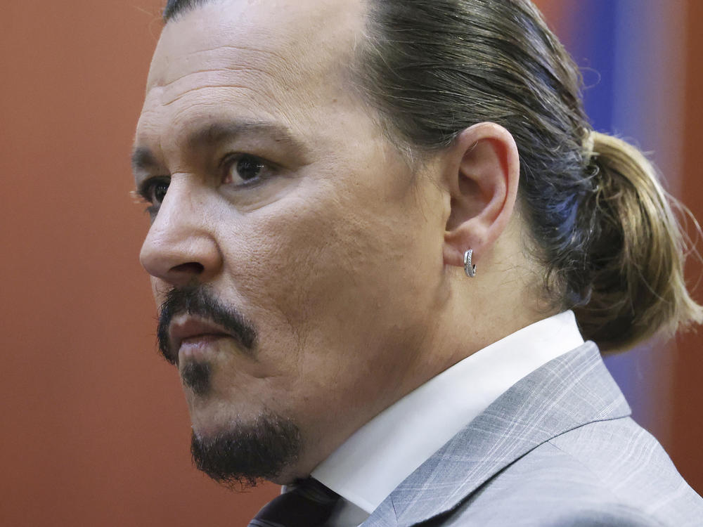 Actor Johnny Depp arrives in the courtroom at Fairfax County Circuit Court in Fairfax, Va., on Thursday.