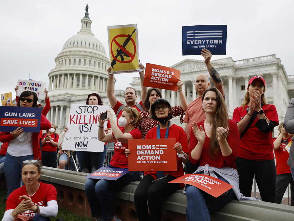 Gun control advocacy groups rally with Democratic members of Congress outside the U.S. Capitol on Thursday. Organized by Moms Demand Action, Everytown for Gun Safety and Students Demand Action, the rally brought together members of Congress and gun violence survivors to demand gun safety legislation following mass shootings in Buffalo, N.Y., and Uvalde, Texas.
