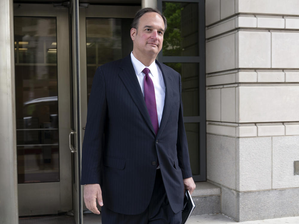 Attorney Michael Sussmann leaves federal court in Washington on April 27.