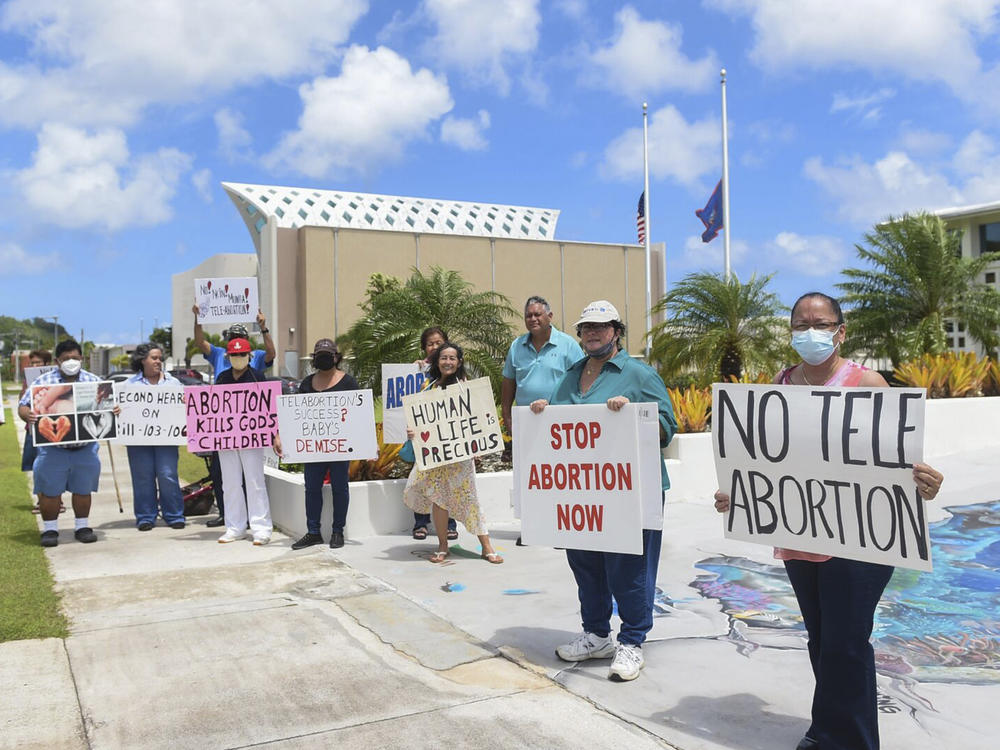 Members of the Catholic Pro-Life Committee hold a demonstration against abortion in front of the Guam Congress Building in Hagåtña on May 3, 2021.