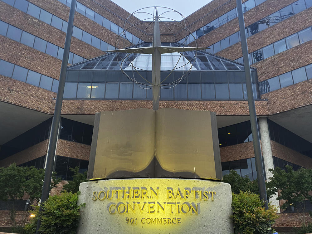 A cross and Bible sculpture stand outside the Southern Baptist Convention headquarters in Nashville, Tenn., on Tuesday. Southern Baptist leaders have released a list of hundreds of pastors and other church-affiliated personnel accused of sexual abuse.