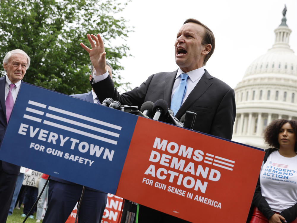 Sen. Chris Murphy, D-Conn., addresses a rally with fellow Senate Democrats and gun control advocacy groups outside the U.S. Capitol on Thursday. Organized by Moms Demand Action, Everytown for Gun Safety and Students Demand Action, the rally brought together members of Congress and gun violence survivors to demand gun safety legislation following mass shootings in Buffalo, N.Y., and Uvalde, Texas.