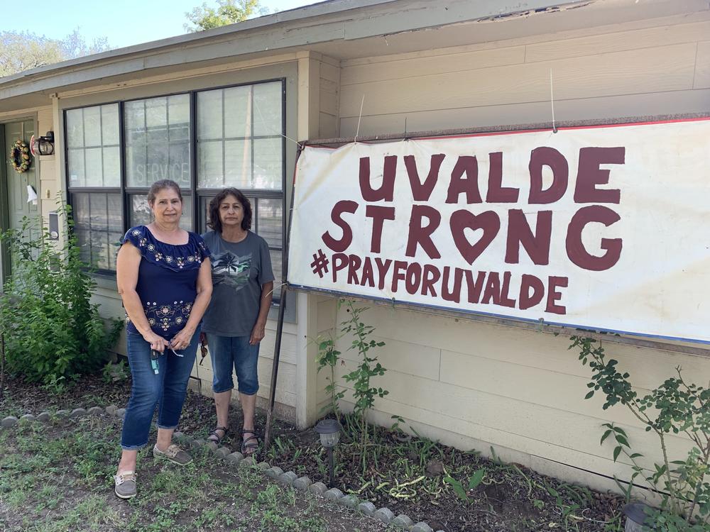 Romie Perez and Elia Zamarripa at Perez's house. The two are among the many holding impromptu cookouts to make meals for the families of the victims.