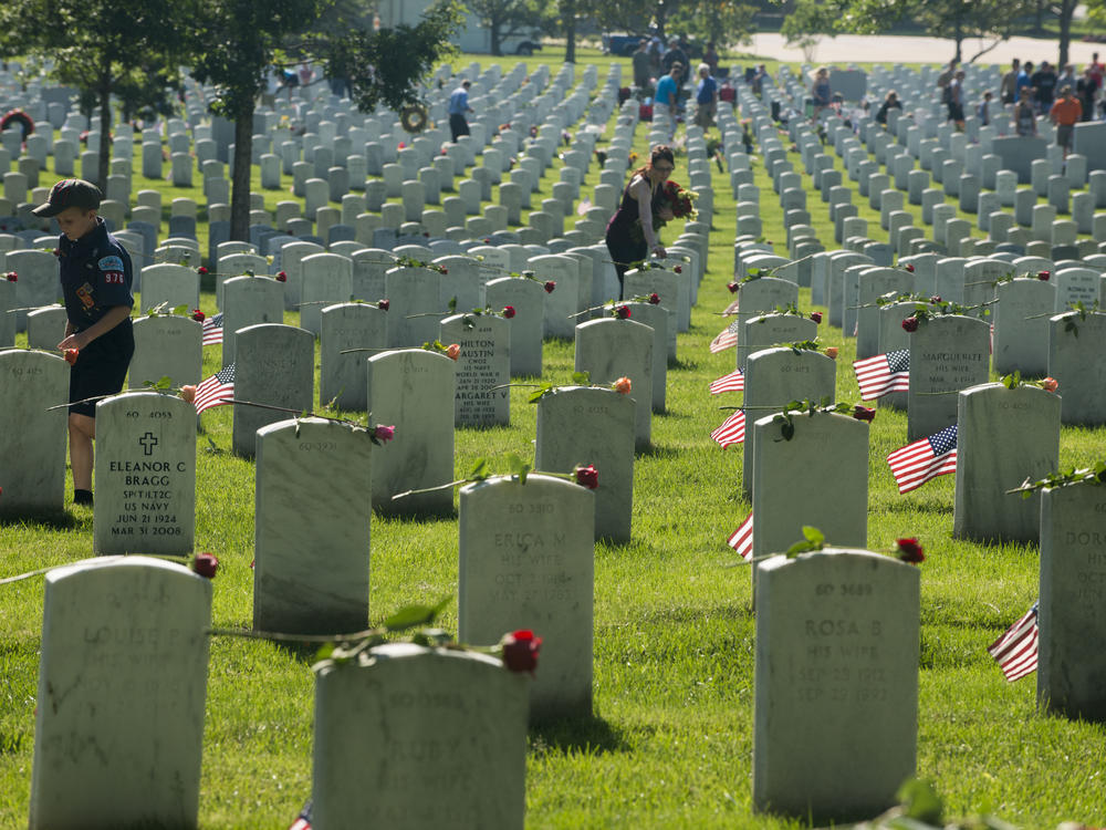 Every year, members from every branch of the military participate in placing flags on more than 400,000 tombstones on the cemetery grounds.