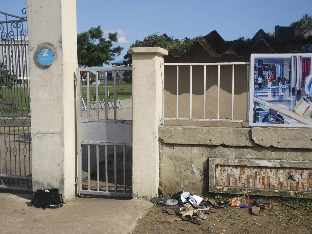 A view of sandles outside Kings Assembly Pentecostal church, following a stampede in Port Harcourt, Nigeria, Saturday, May 28, 2022.