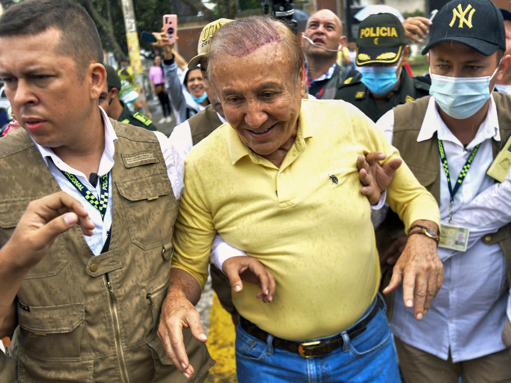 Rodolfo Hernandez, presidential candidate with the Anti-corruption Governors League, leaves a polling station after voting in presidential elections in Bucaramanga, Colombia, Sunday, May 29, 2022.