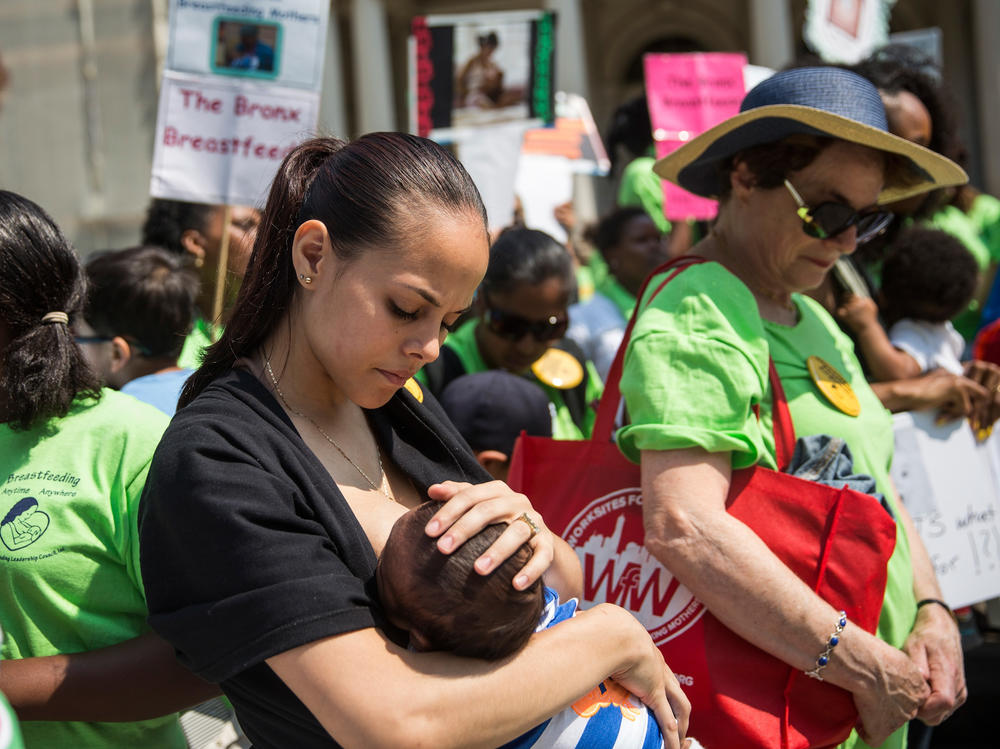 The baby-formula shortage has led some to question why the U.S. doesn't provide more support for breastfeeding. Here, a woman breastfeeds her son outside New York City Hall during a 2014 rally to support breastfeeding in public.
