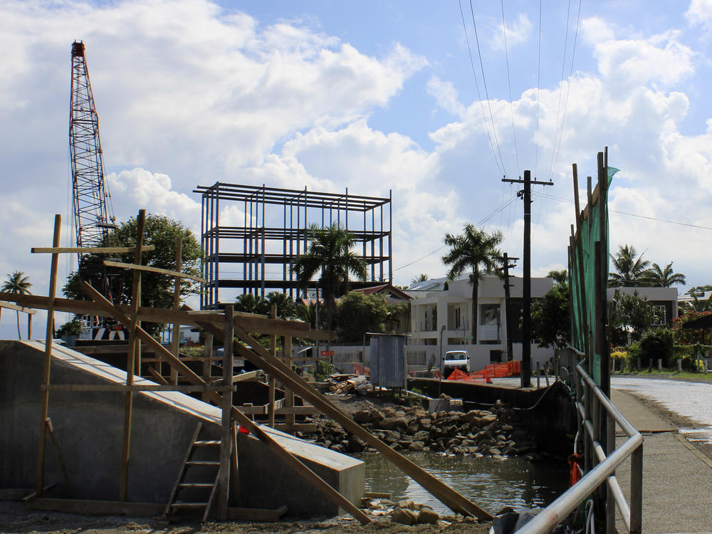 Scaffolding is erected at a China Railway construction site along the seawall near the Chinese Embassy in Suva, Fiji, Friday, May 27, 2022.